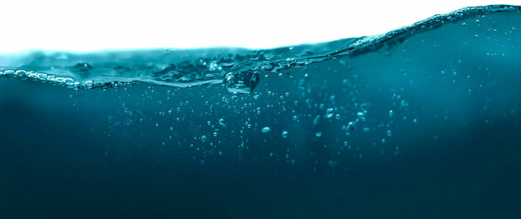 Sunlight rays highlighting the pollutants in wastewater