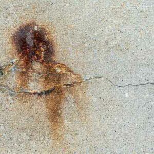 Oxalic Acid works as a rust stain remover on concrete as show in this example.